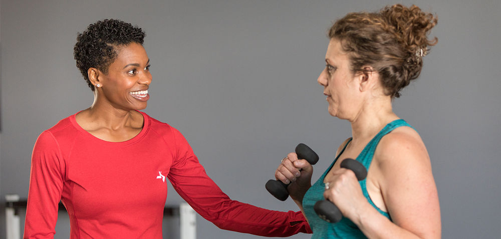 Wrist Weights Vs. Dumbbells: Which One Sculpts Stronger Arms? A Trainer Weighs In (Women's Health)